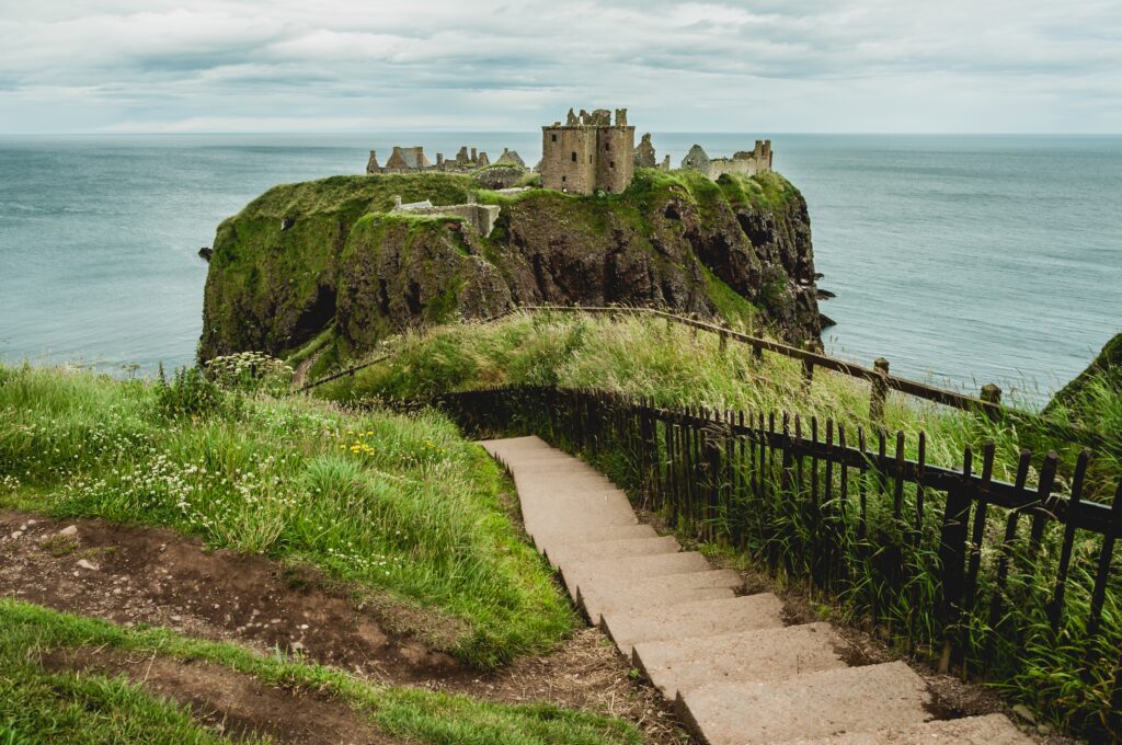picture of concrete stairs against dunnottar castle in stonehaven, uk